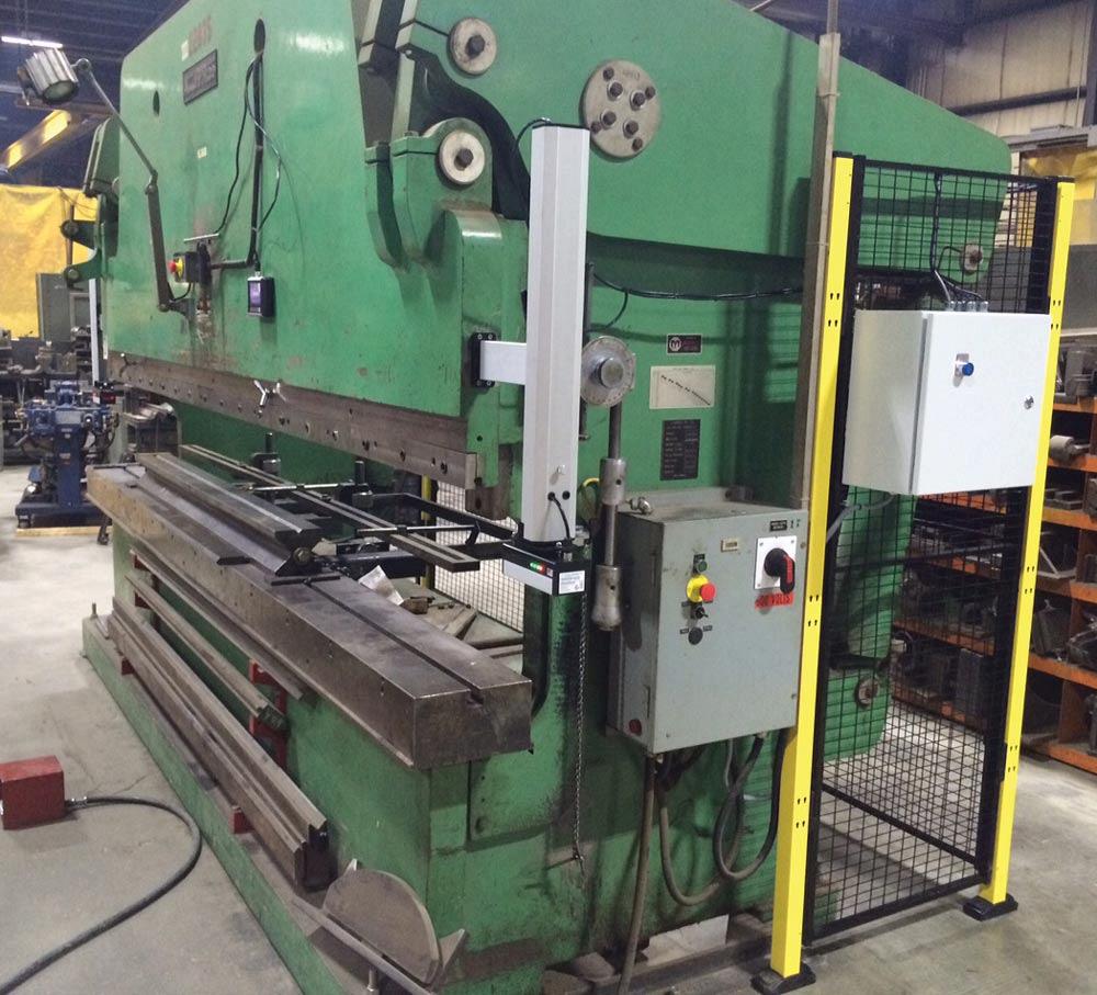 Photo of press brake retrofitted with safety equipment.
