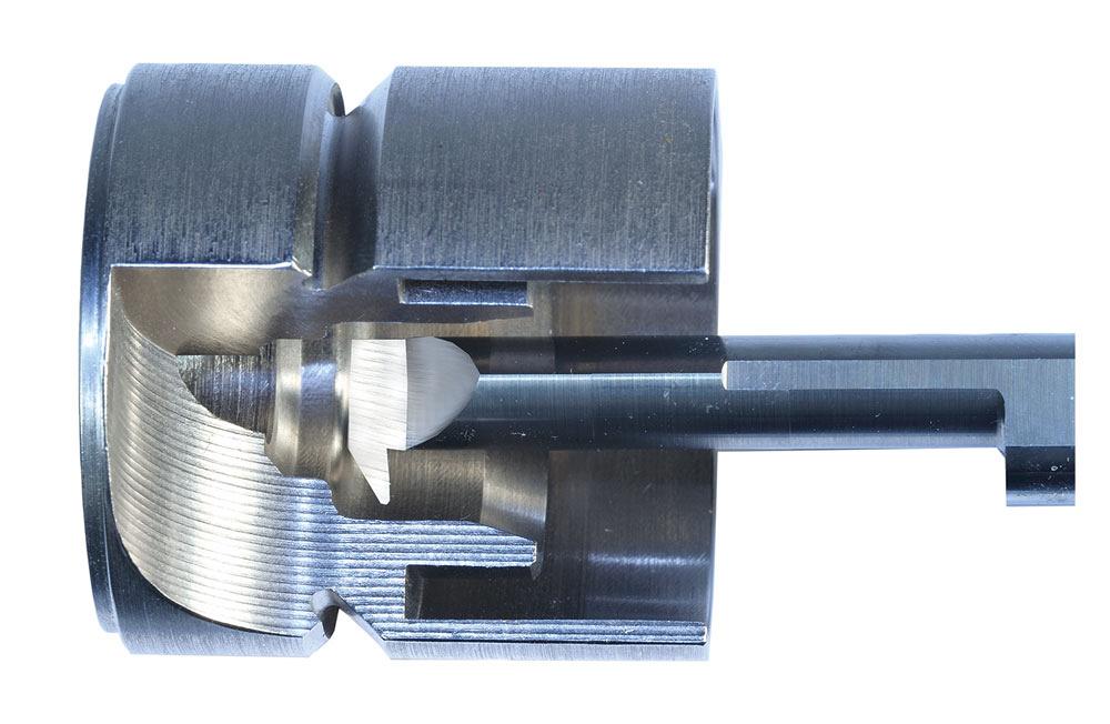 A tool reverse profiles out of a bore.
