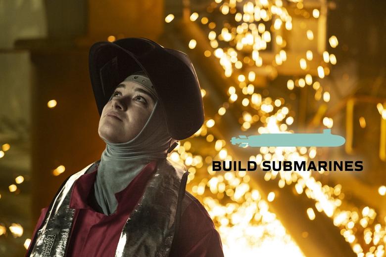 Woman welder building submarines