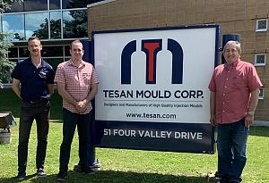 Jesse, Lucas, and Riccardo Tesan in front of Tesan Mould. 