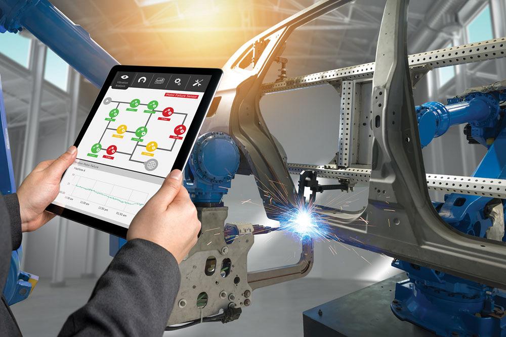 A tablet used to check real-time vibration analysis of an automobile manufacturing application in smart factory. 