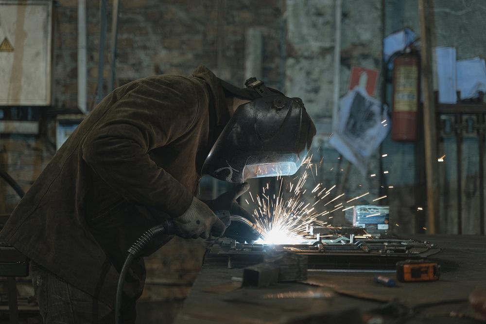 A welder on the manufacturing floor