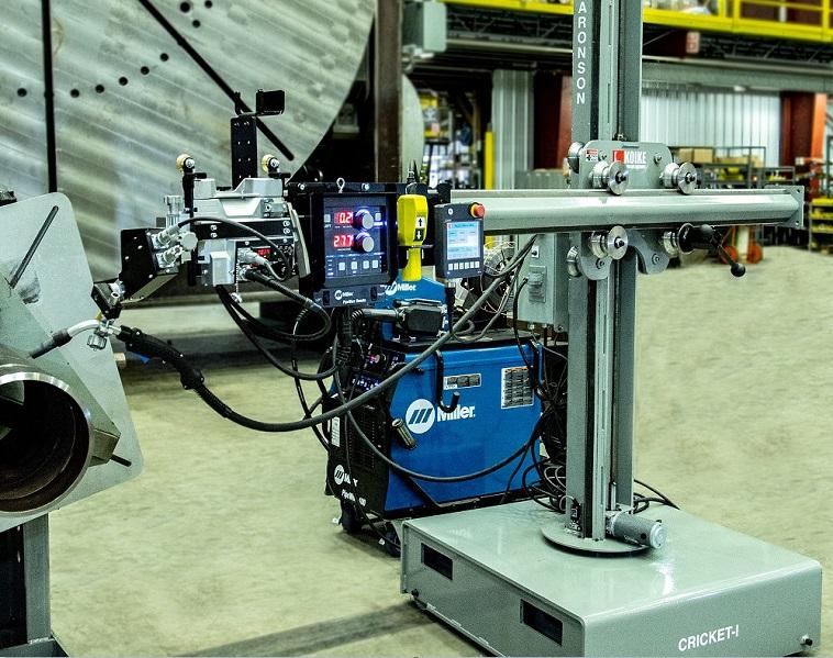 Mechanized welding package uses SAW, openarc processes