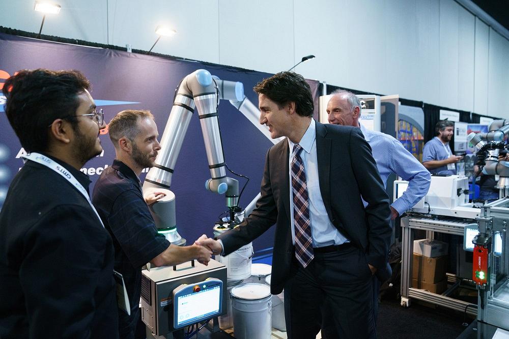Justin Trudeau visits with manufacturers at a booth at CMTS.