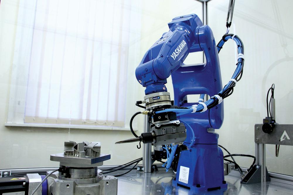 Robotic finishing with no-code programming aids metal finishers