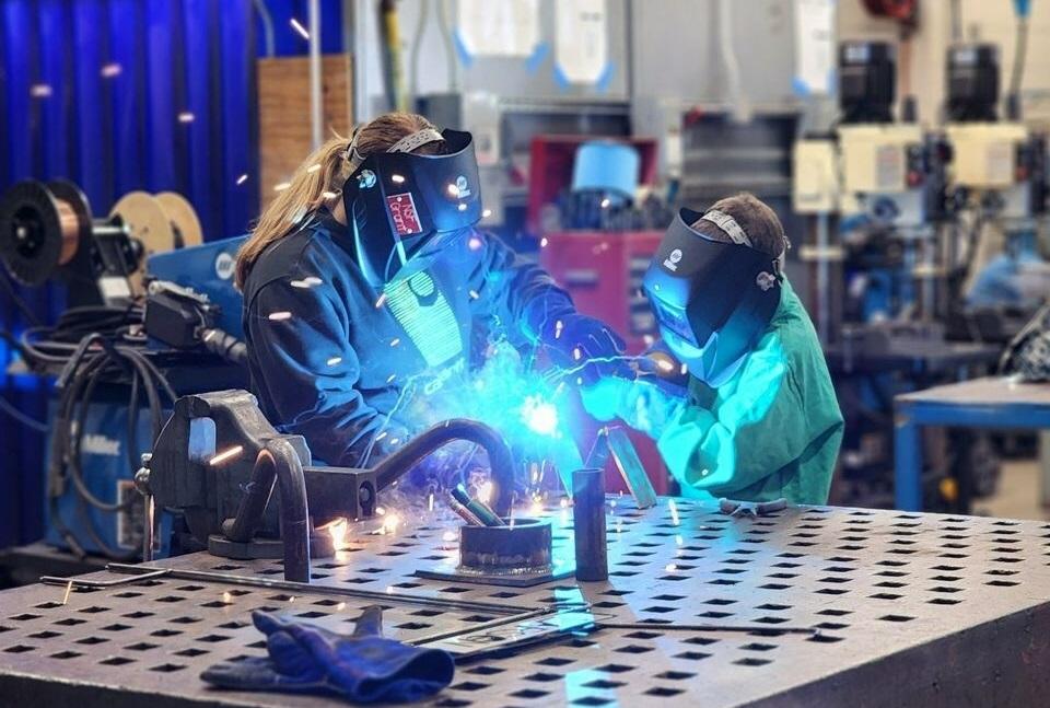 Student participants learn to weld at NBT Summer Manufacturing Camp.