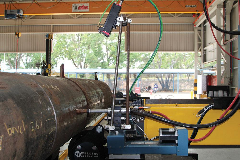 Camera shows progress and quality of submerged arc welding process.