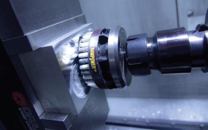 For Orange Vise
Company, a
manufacturer of CNC
machine vises, the
unique combination
of automated
deburring and
surfacing finishing
eliminated several
time consuming and
laborious processes