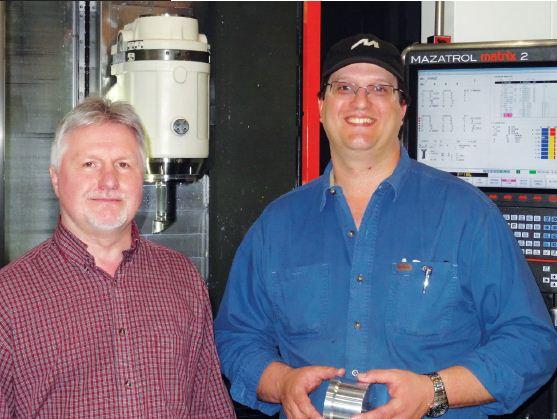Standing in front of a Mazak Integrex i-300 five-axis lathe with live tooling, Phil Archer, sales manager (left), and Pedro Fernandes, president, Mahler Industries.