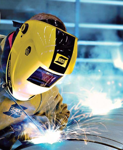 Proper clothing protects these pipe welders. PHOTO COURTESY OF
ESAB
