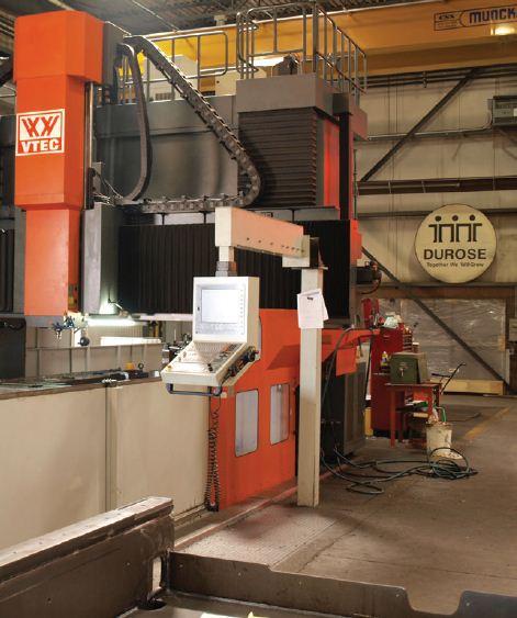 VTEC double column machining center for drilling and machining.