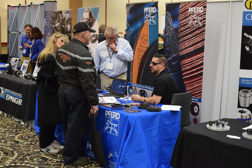 MMP Expo attendees chat with the Pferd team on the show floor. 