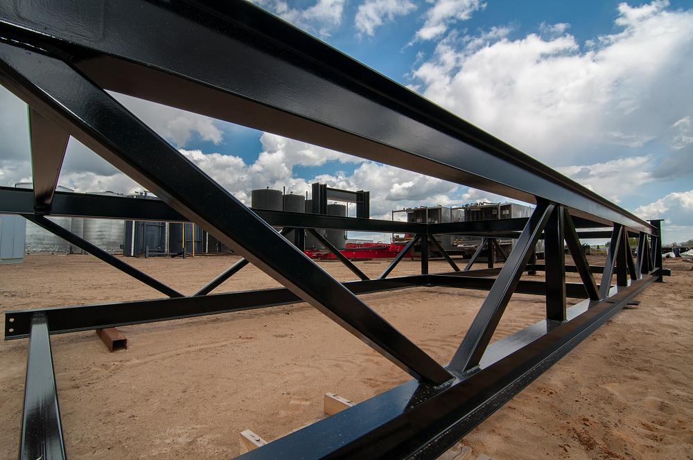 Modular structural steel projects provide elevational supports, well pads, and other field needs.