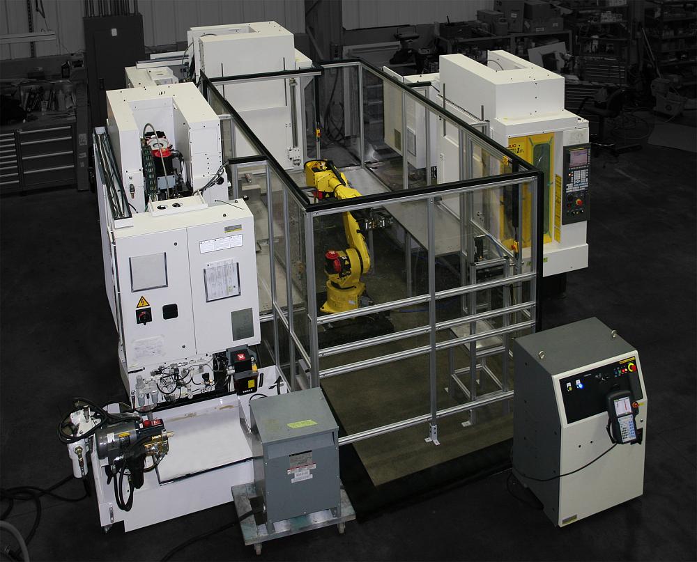 Basic automation cells comprise a single machine and a single robot, but in this example, three machines are being tended by a single robot.
