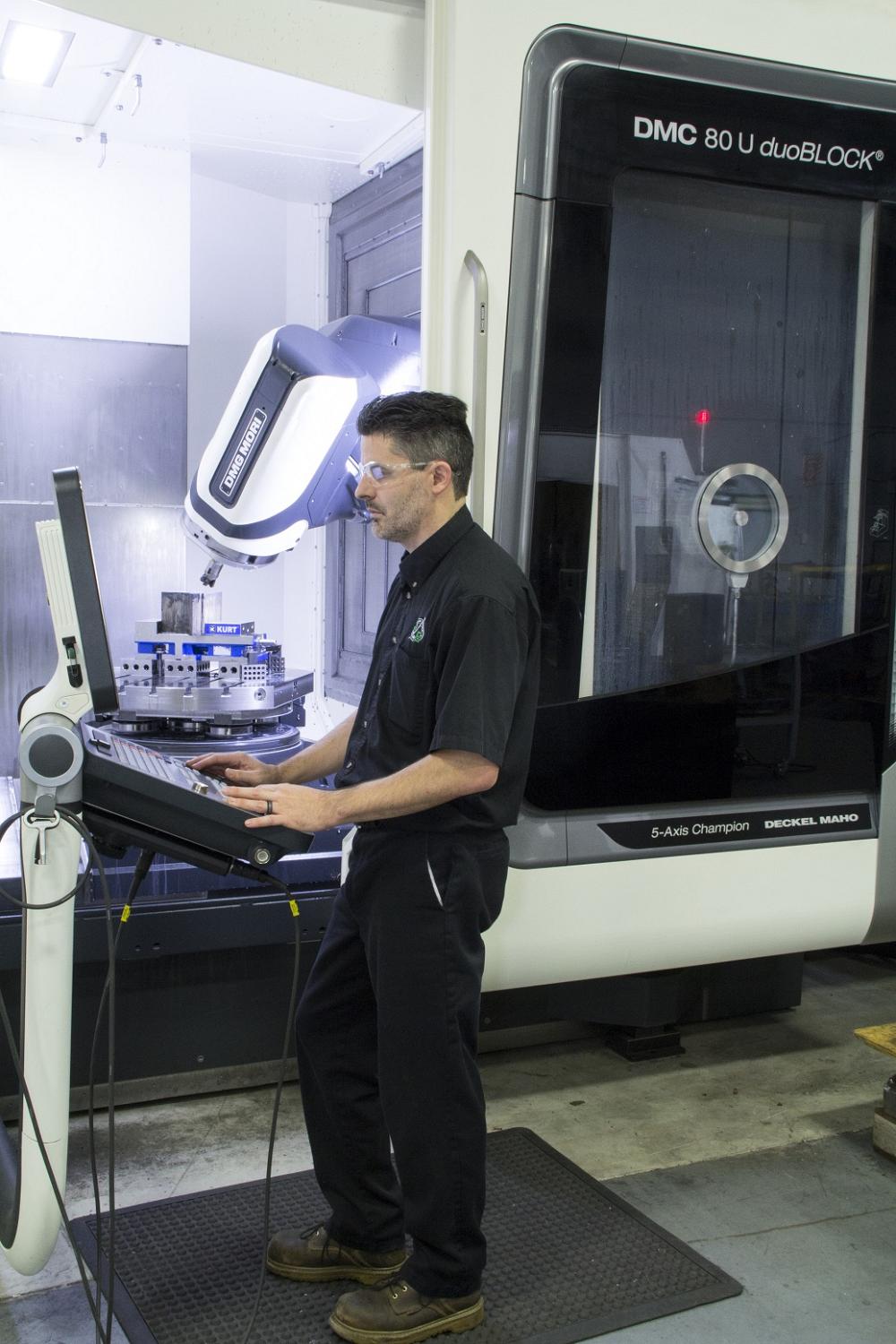 Plant Manager Derek Rozon uses 5-axis machining to reduce cycle times and improve part quality.