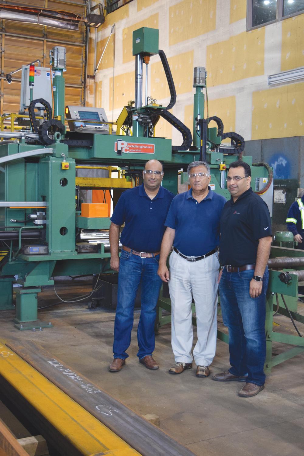 Karim, Amin and Alim Walji on the AI Industries shop floor.