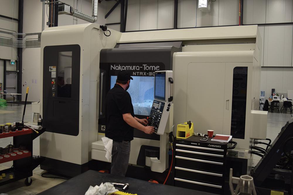 Precision ADM Manufacturing Technician Clayton Pollock uses the company’s Nakamura-Tome NTRX-300 to performtrue 5-axis milling.