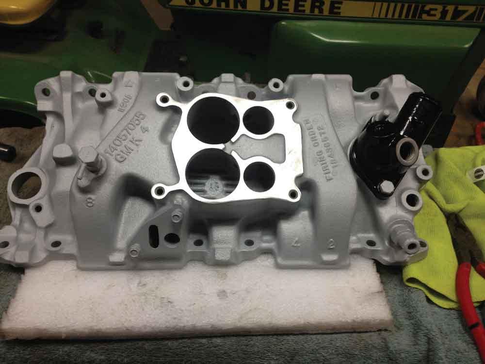 Shown is a powder-coated intake manifold.
