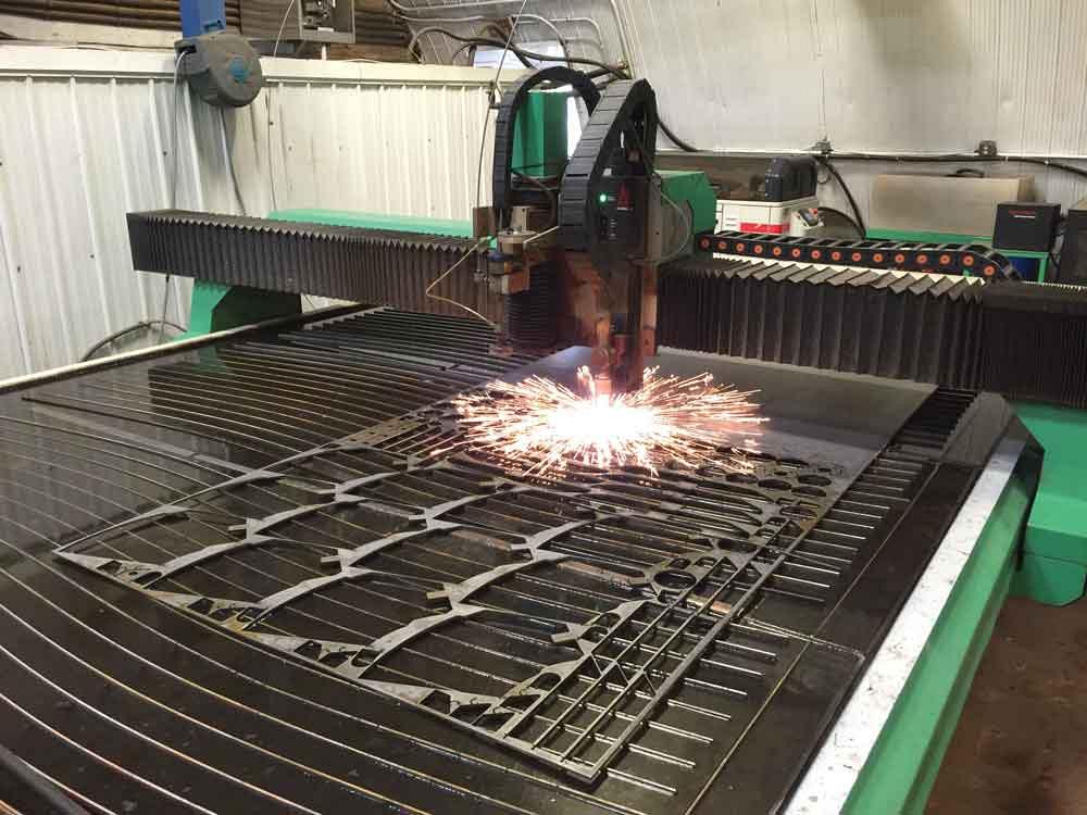 Stewart Steel's 10-ft.-wide by 16-ft.-long Machitech table is equipped with the KMT Waterjet STREAMLINE SL-V 60,000 PSI, 60-HP intensifier pump and an HPR260 Hypertherm HyDefinition plasma torch. 