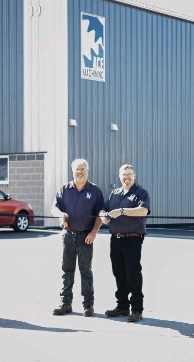 Co-owners Andy Race and Ron Wallace cut the ribbon at Ace Machining’s new,14,500-sq.-ft. Dartmouth, N.S., location. Photo courtesy of Ace Machining.