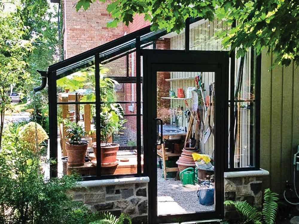 A gardening storage shed was designed to extend from building's exterior wall.